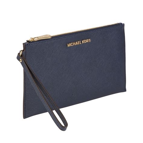 michael kors jet set clutch uk|MICHAEL Michael Kors Jet Set Travel Medium Zip Clutch Bag.